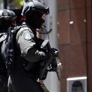 الشرطة الأسترالية تقوم بتطويق مكان احتجاز الرهائن (AFP)