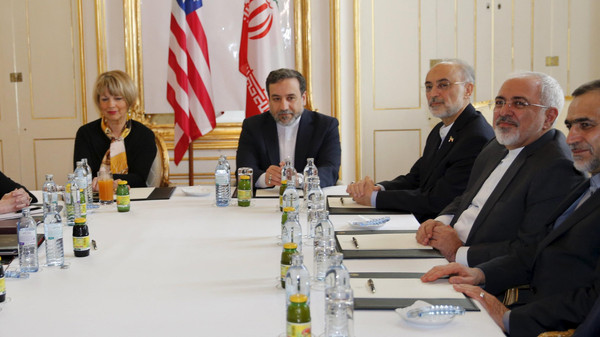 U.S. Secretary of State John Kerry and U.S. Under Secretary for Political Affairs Wendy Sherman meet Iranian Foreign Minister Javad Zarif at a hotel in Vienna, Austria