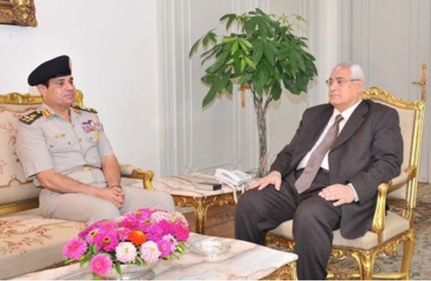 الغارديان: السيسي ومنصور استغلا غياب البرلمان لإصدار قوانين صارمة - أرشيفية 