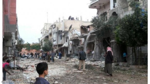 آثار الدمار من جراء قصف القوات الحكومية على حي الوعر غربي حمص