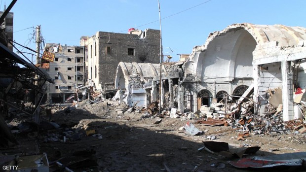 صورة أرشيفية لآثار الدمار في مدينة دير الزور