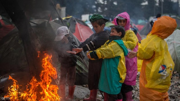 أطفال مهاجرون في أحد المخيمات في اليونان - 12 مارس 2016