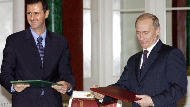 بوتن والأسد في لقاء بموسكو عام 2005