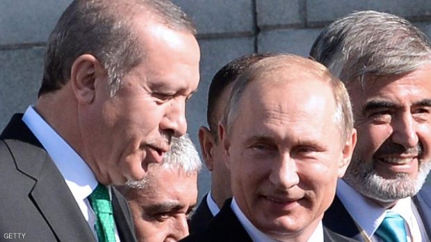 فلاديمير بوتن (يمين) والتركي رجب طيب أردوغان (يسار)